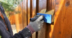 Learn how to stain a fence.