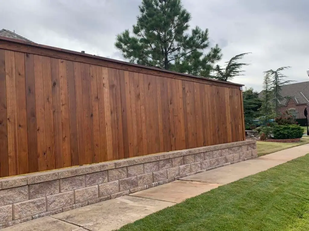 Custom cedar fence stained by Patriot Fence and Stain — the trusted fence staining company used by leading Oklahoma fence builders.