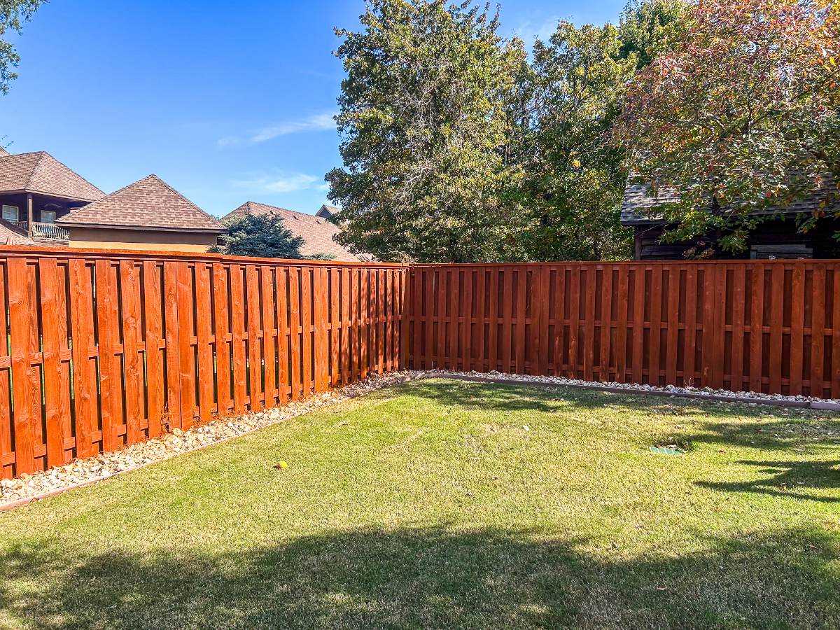 Fence after professional staining, Patriot Fence & Stain