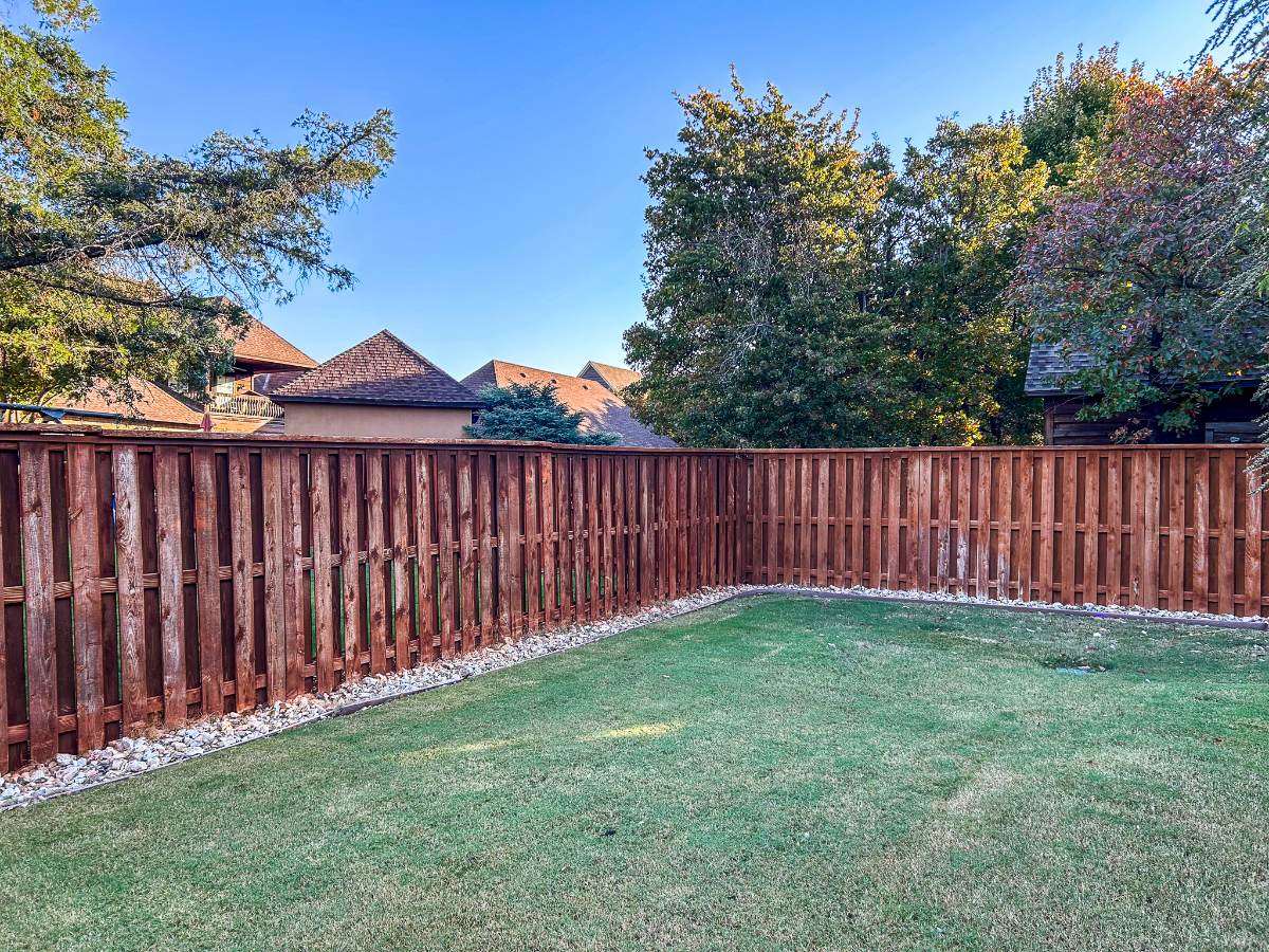 Fence before professional staining, Patriot Fence & Stain